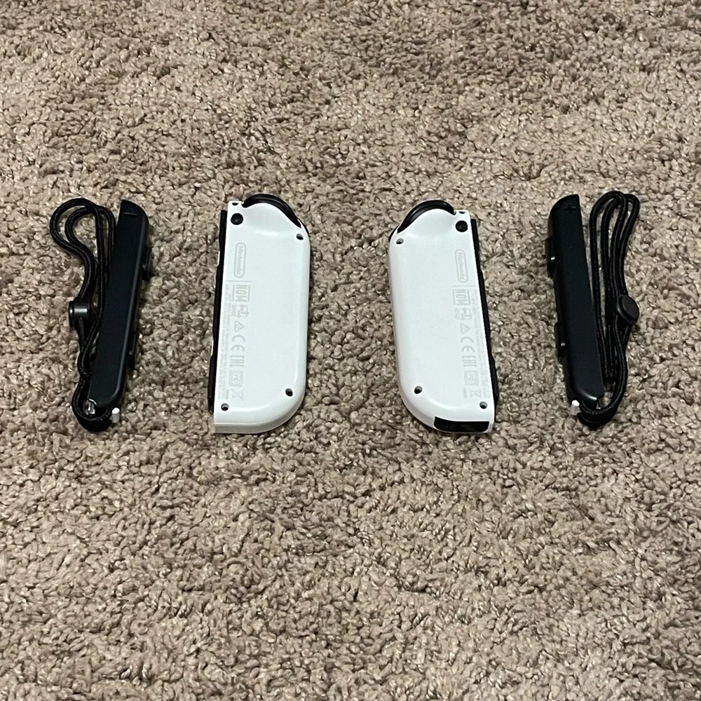 Nintendo Switch White OLED Joy-Cons with side straps